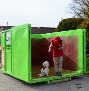 dog and handler in a bin there dump that bin rental