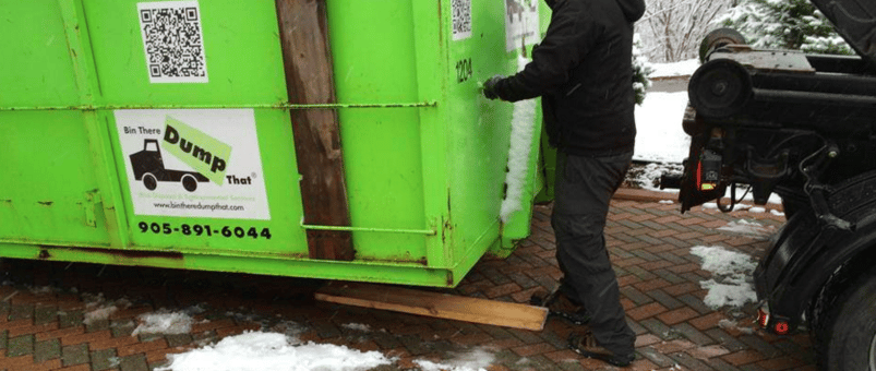 protective boardsrest on the driveway and reduce the chance of a dumpster rental from sliding