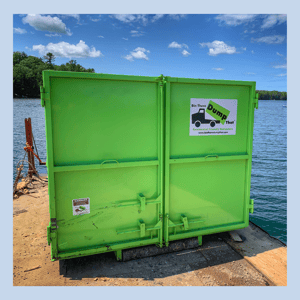 Bin There Dump That bin rental on a barge